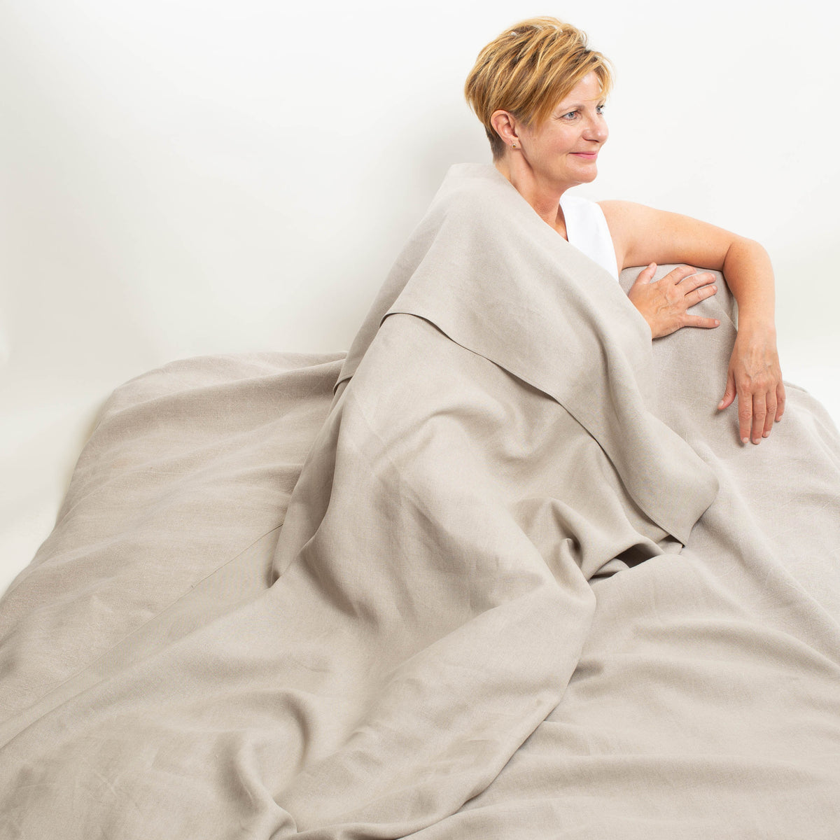 Kühlende Bettdecke | Leinenlaken und leichte Lodendecke