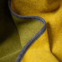 lodendecke-schurwolle-warme_wolldecke-grun-gelb-2