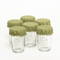 6 Glasabdeckungen aus Leinen auf Trinkgläsern grün