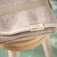 hundematte_schurwolle_mit_trageriemen_beige-4