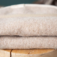 hundematte_schurwolle_mit_trageriemen_beige-5